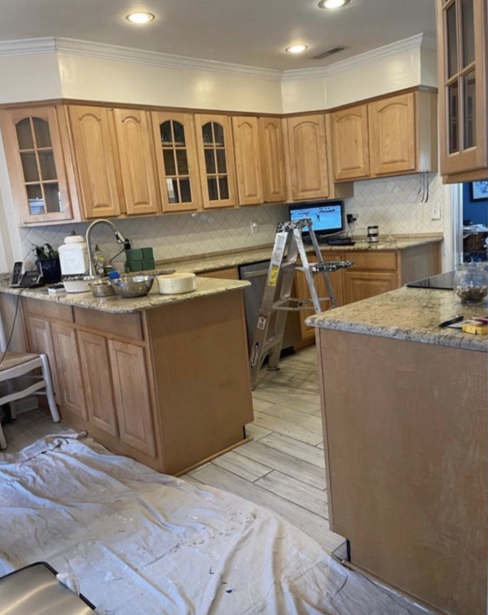 Kitchen before painting - wood cabinets